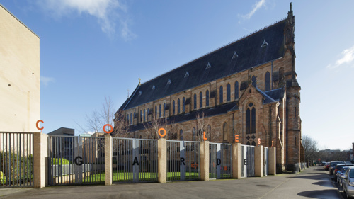 St Francis Centre exterior view with garden