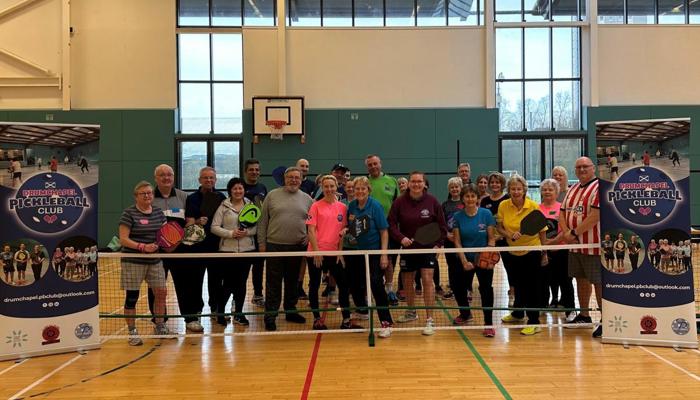 A group of people at Drumchapel after playing pickleball