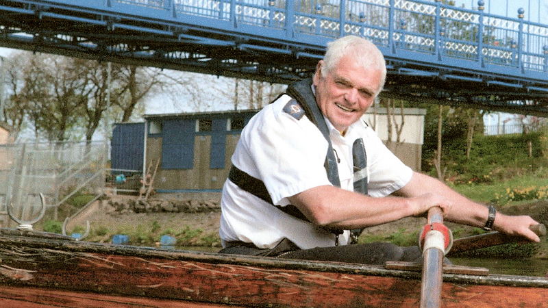 Photograph of George Parsonage in rowing boat on the River Clyde