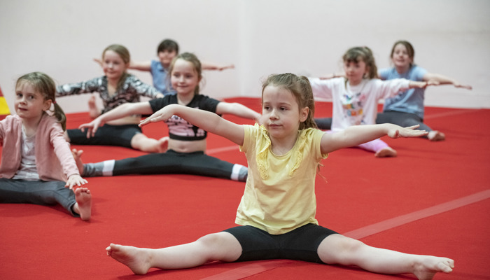 gymnastics team on the floor