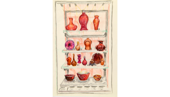 cabinet with assortment of red glassware on shelves