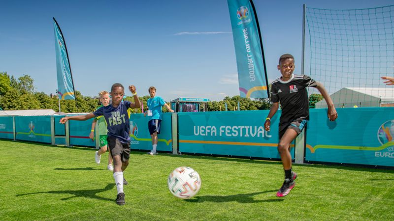 Young people playing football