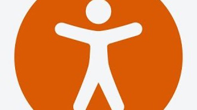 The Reachdeck symbol, showing a human figure on an an orange button