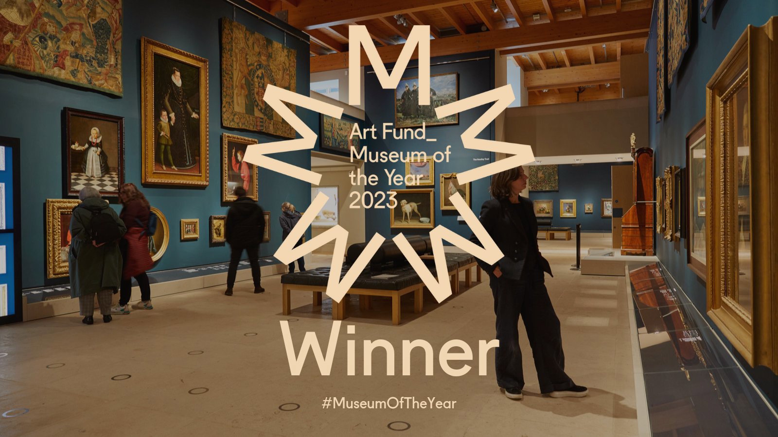 Inside The Burrell Collection in Glasgow with the Art Fund Museum of the Year logo in the middle of the image.