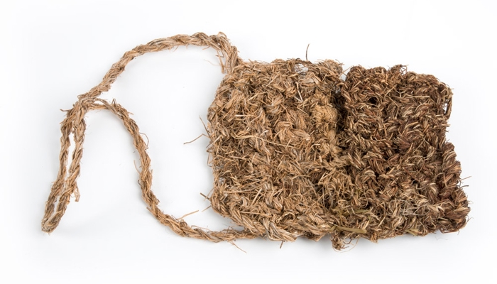 Artwork of pouch made from grass