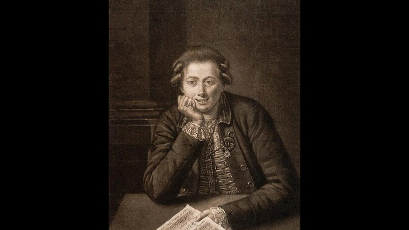 Illustration of a man from the 18th century. He is sitting at a table with his chin in his hands, smiling.