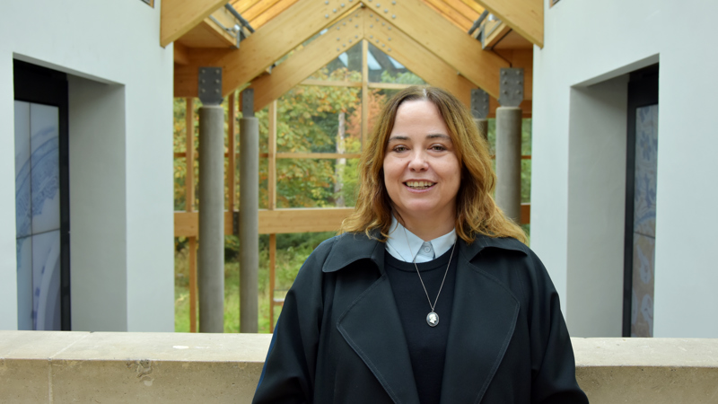 Photograph of the fashion historian, writer and curator, Mairi MacKenzie, photographed inside the Burrell Collection