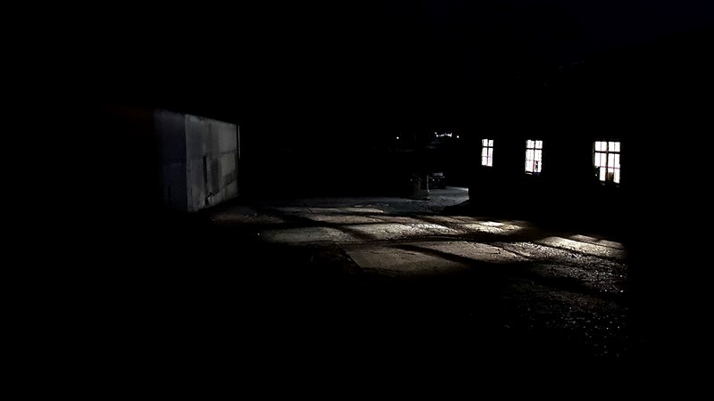 Photograph of a building in the dark
