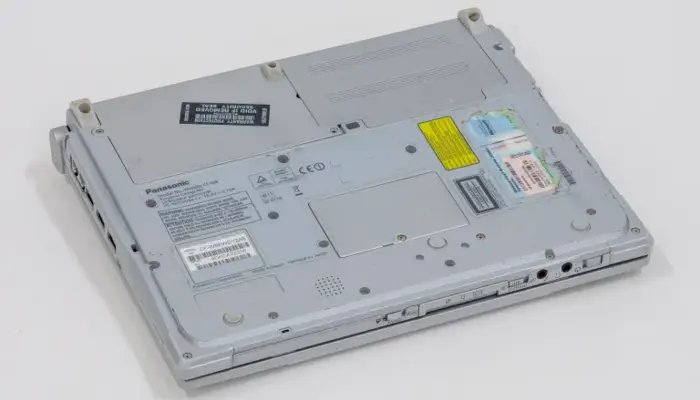 a photograph of a grey laptop