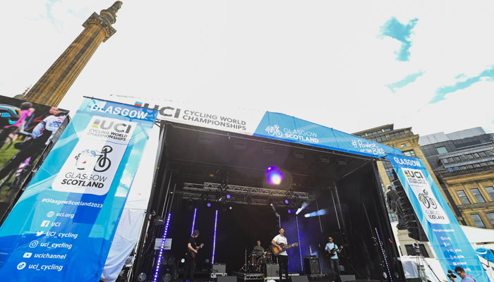 A band of musicians performing on the main stage in the George Square fan zone in Glasgow during the 2023 UCI Cycling World Championships.