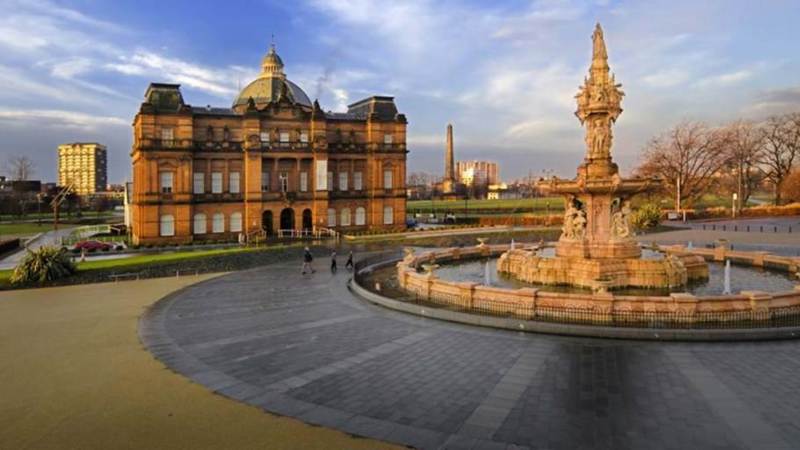 Peoples palace and fountain set against a blue winter sky