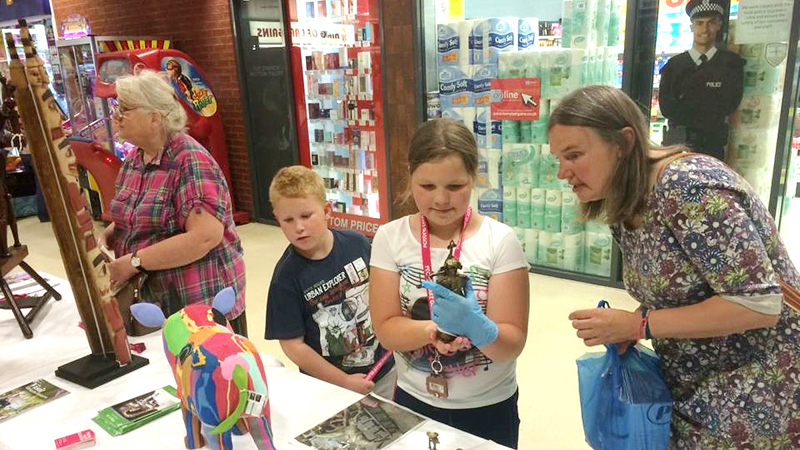 Photograph showing children and adult educator attending an event for the Open Museum