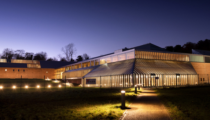 Image of the Burrell Collection lit up at night time