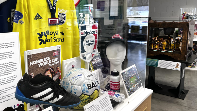 Photograph shows a display featuring football nostalgia.